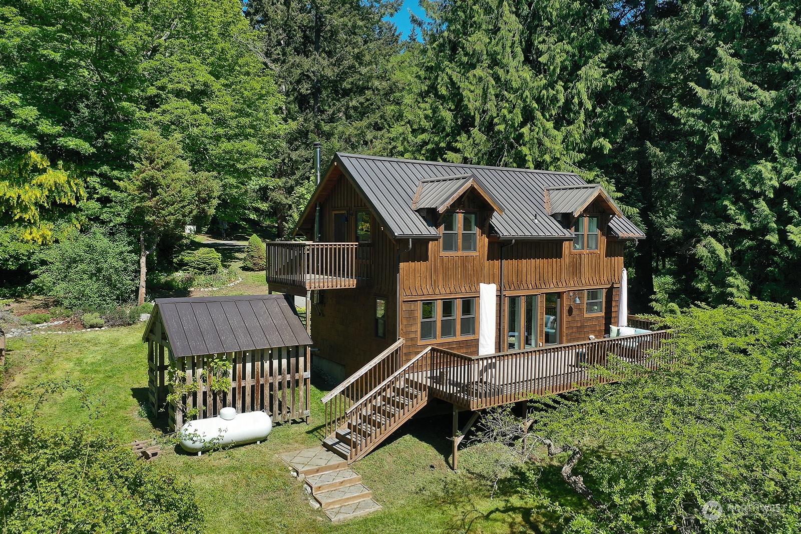 5368 Mapleglen Road Langley, WA 98260 - Photo 28 of 40 an aerial view of a house with a yard