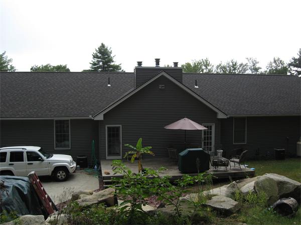 53 Bunyan Road Monson, MA 01057 - Photo 1 of 30 a terrace of a house with yard fire pit and outdoor seating