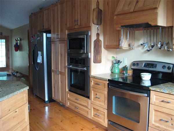 53 Bunyan Road Monson, MA 01057 - Photo 14 of 30 a kitchen with stainless steel appliances granite countertop a refrigerator and a stove