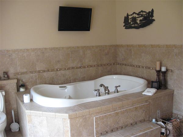 53 Bunyan Road Monson, MA 01057 - Photo 23 of 30 a bathroom with a bathtub