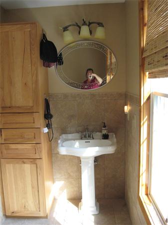 53 Bunyan Road Monson, MA 01057 - Photo 24 of 30 a bathroom with a sink and mirror