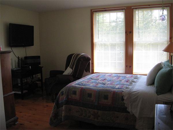 53 Bunyan Road Monson, MA 01057 - Photo 27 of 30 a bedroom with a bed and a window