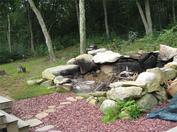 53 Bunyan Road Monson, MA 01057 - Photo 9 of 30 a view of a table and chairs in backyard