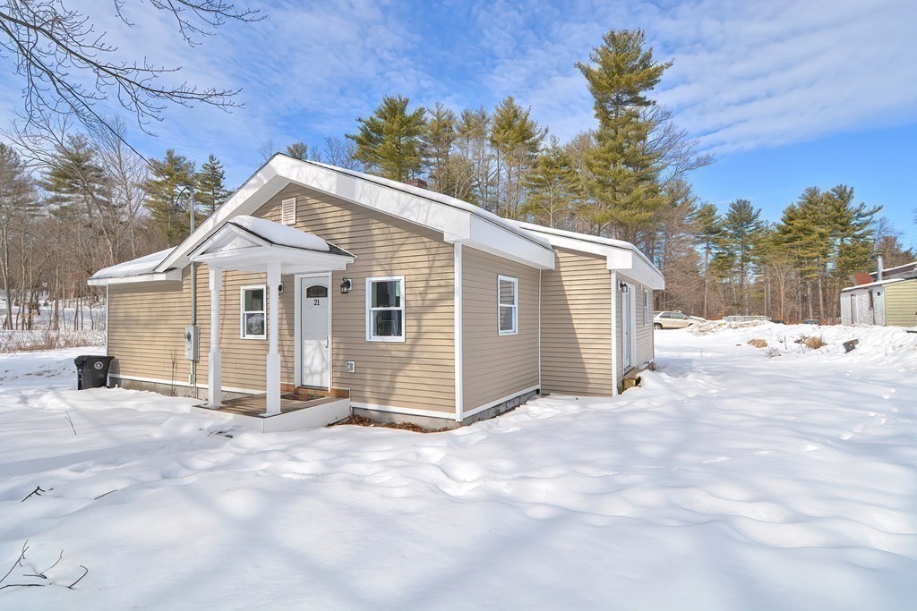 21 Groton Road Shirley, MA 01464 - Photo 25 of 27 a view of a house with a yard