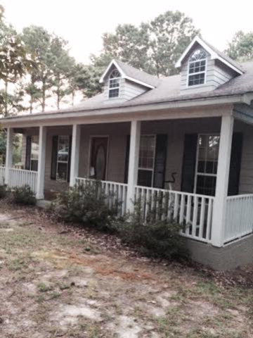 3227 Jordan Road Byron, GA 31008 - Photo 1 of 1 a view of a house with a yard