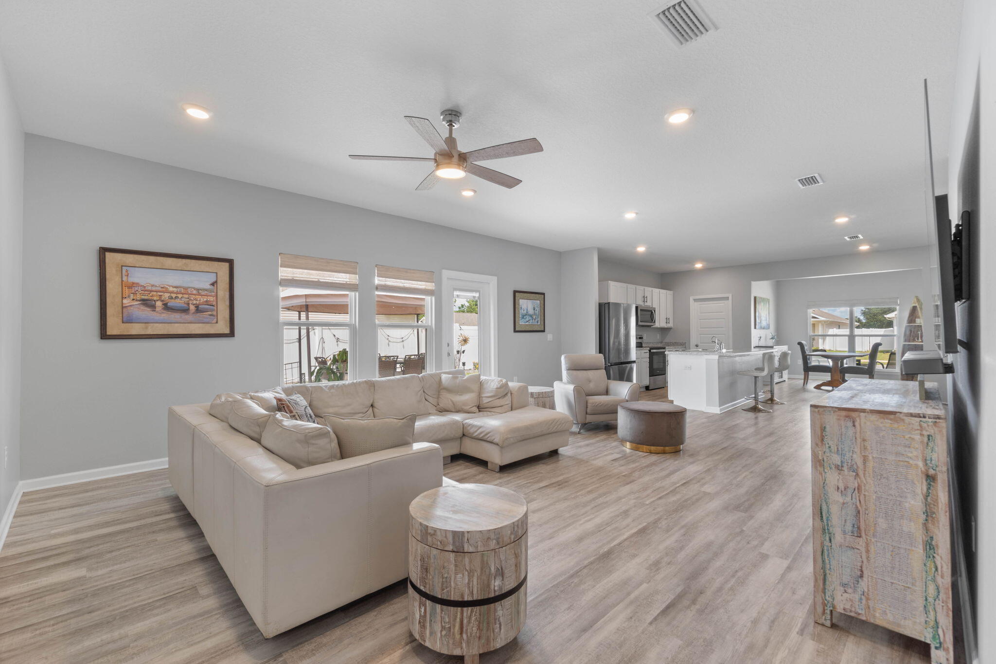 38 Silverthorn Street Freeport, FL 32439 - Photo 17 of 42 a living room with furniture and a wooden floor
