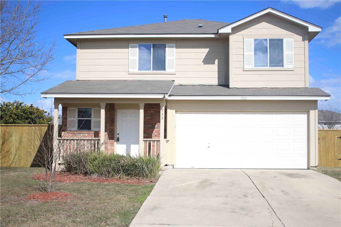 352 Donatello Kyle, TX 78640 - Photo 1 of 1 a front view of a house with garden