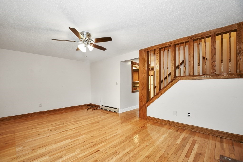 164 Ayer Road, Unit H4 Shirley, MA 01464 - Photo 3 of 33 a view of an empty room with a window