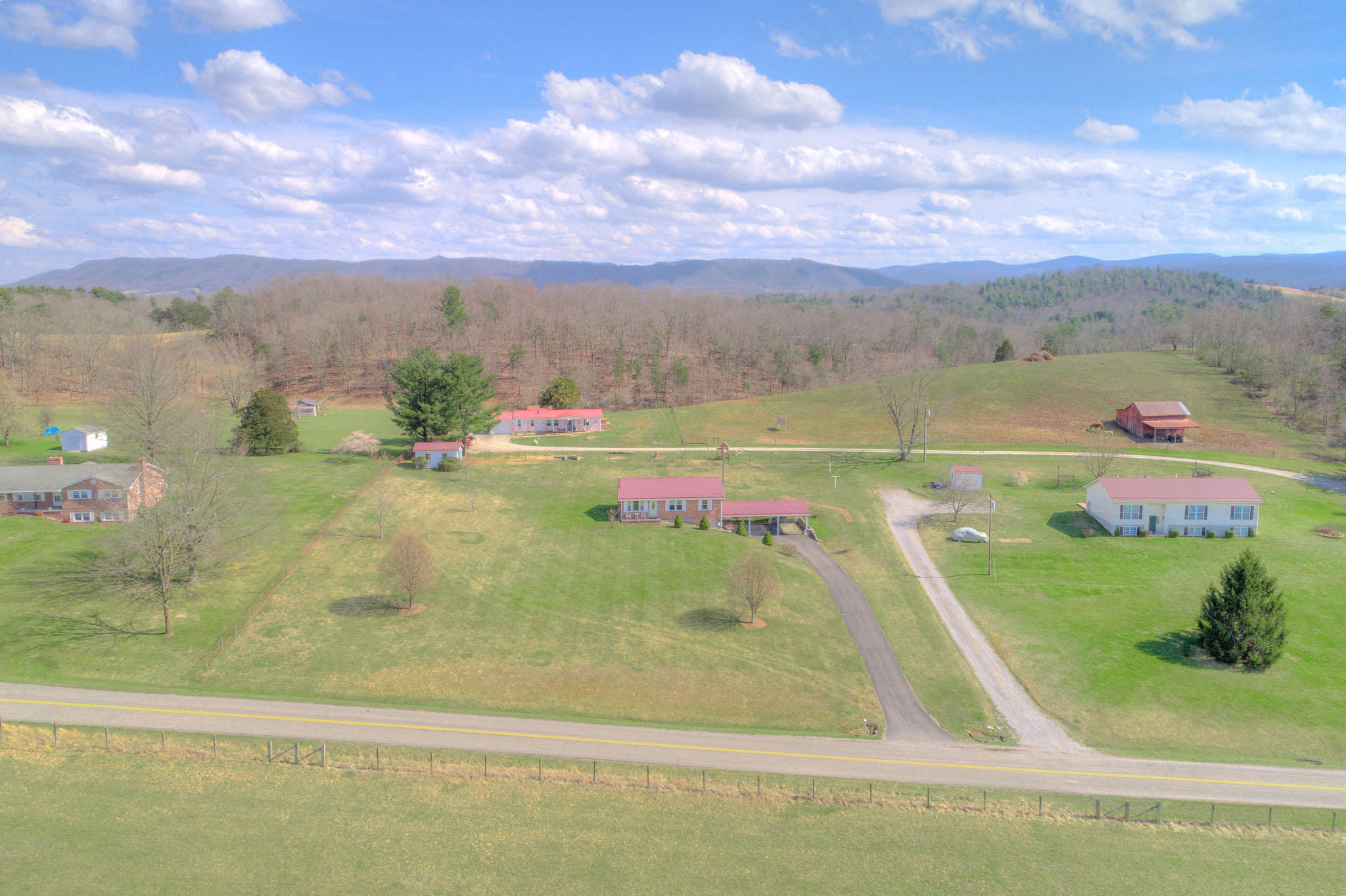 4964 Lizzie Gunn Road Pulaski, VA 24301 - Photo 2 of 31 a view of an outdoor space and a lake view