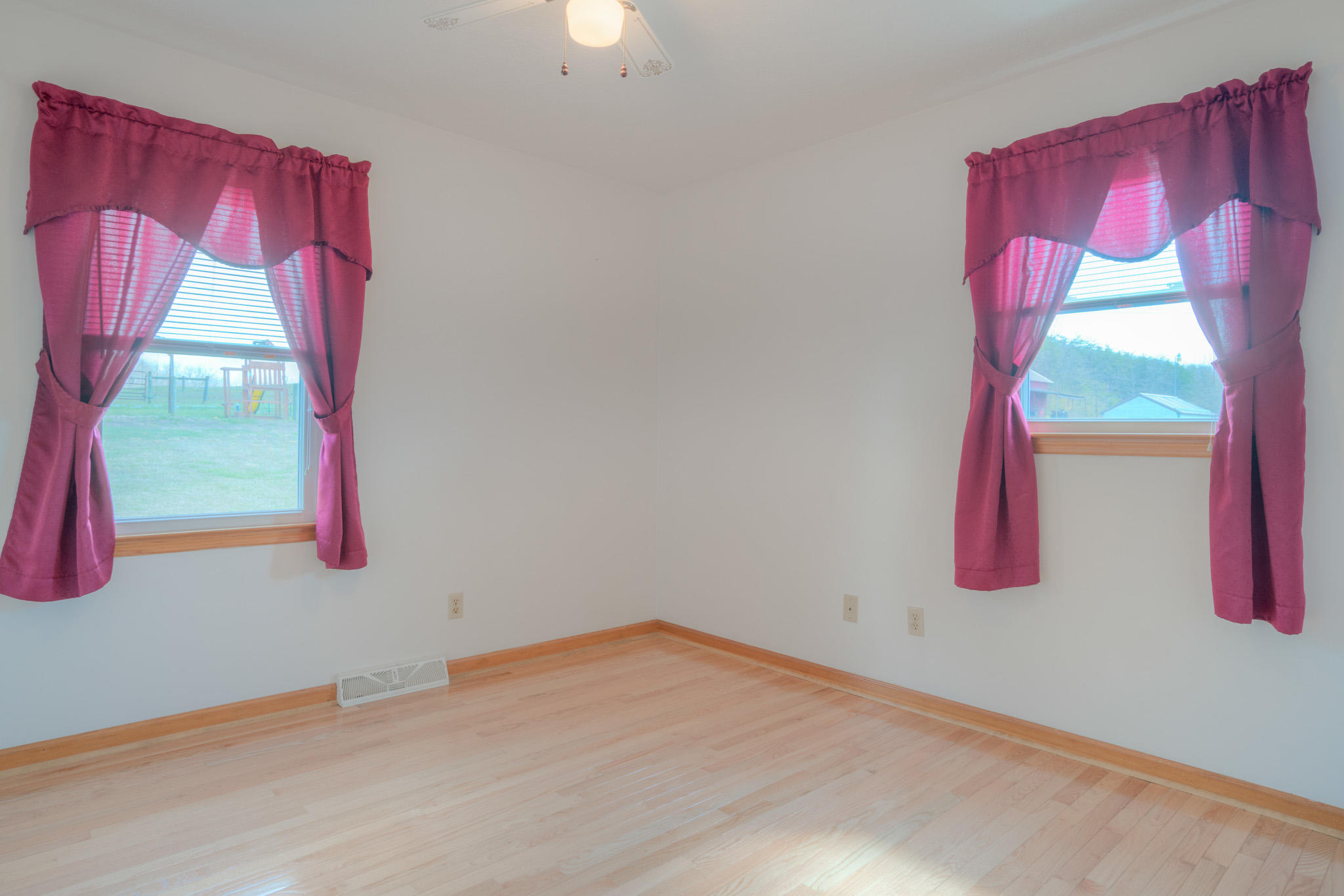 4964 Lizzie Gunn Road Pulaski, VA 24301 - Photo 15 of 31 a room with a bed and a window