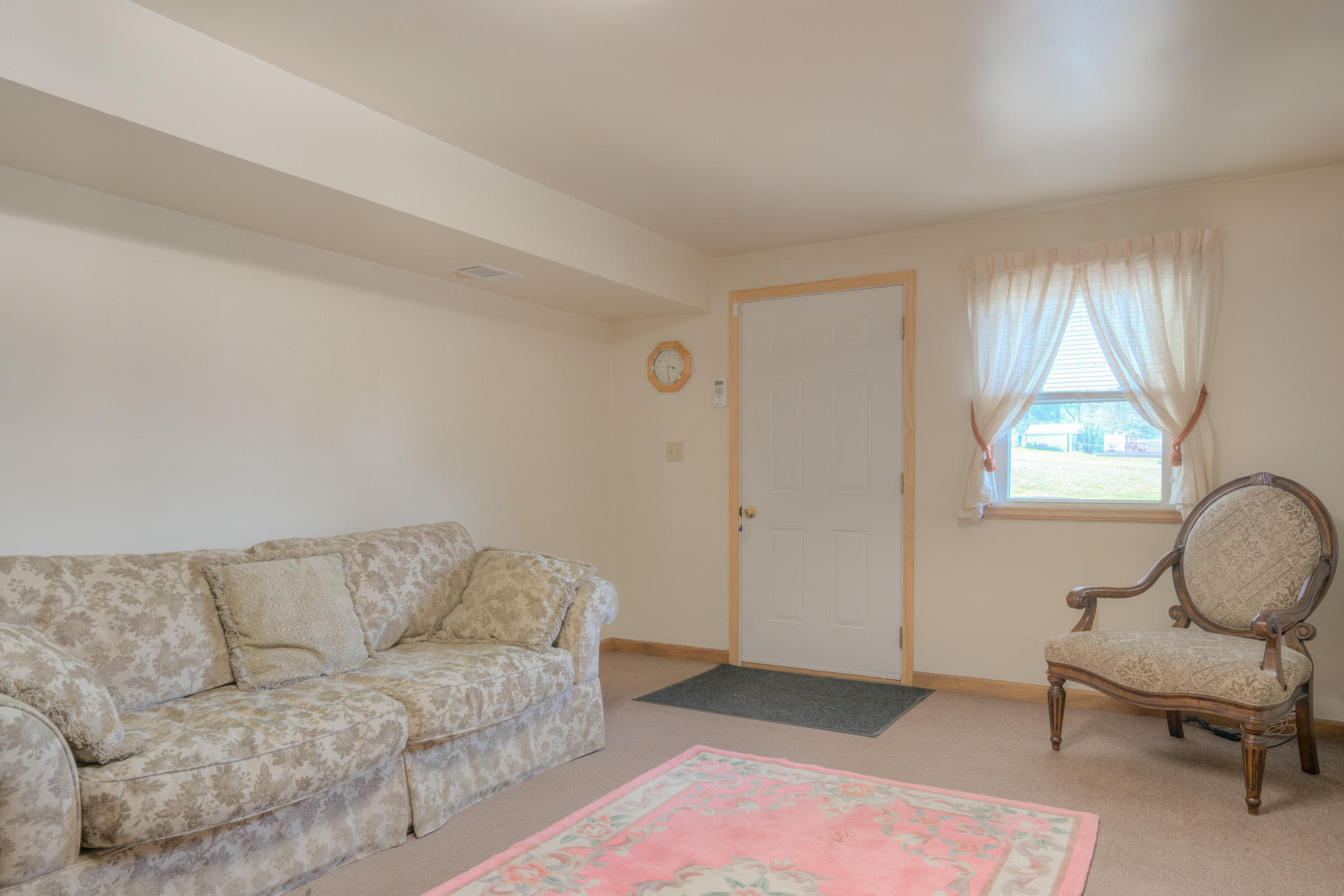 4964 Lizzie Gunn Road Pulaski, VA 24301 - Photo 18 of 31 a living room with furniture and a window