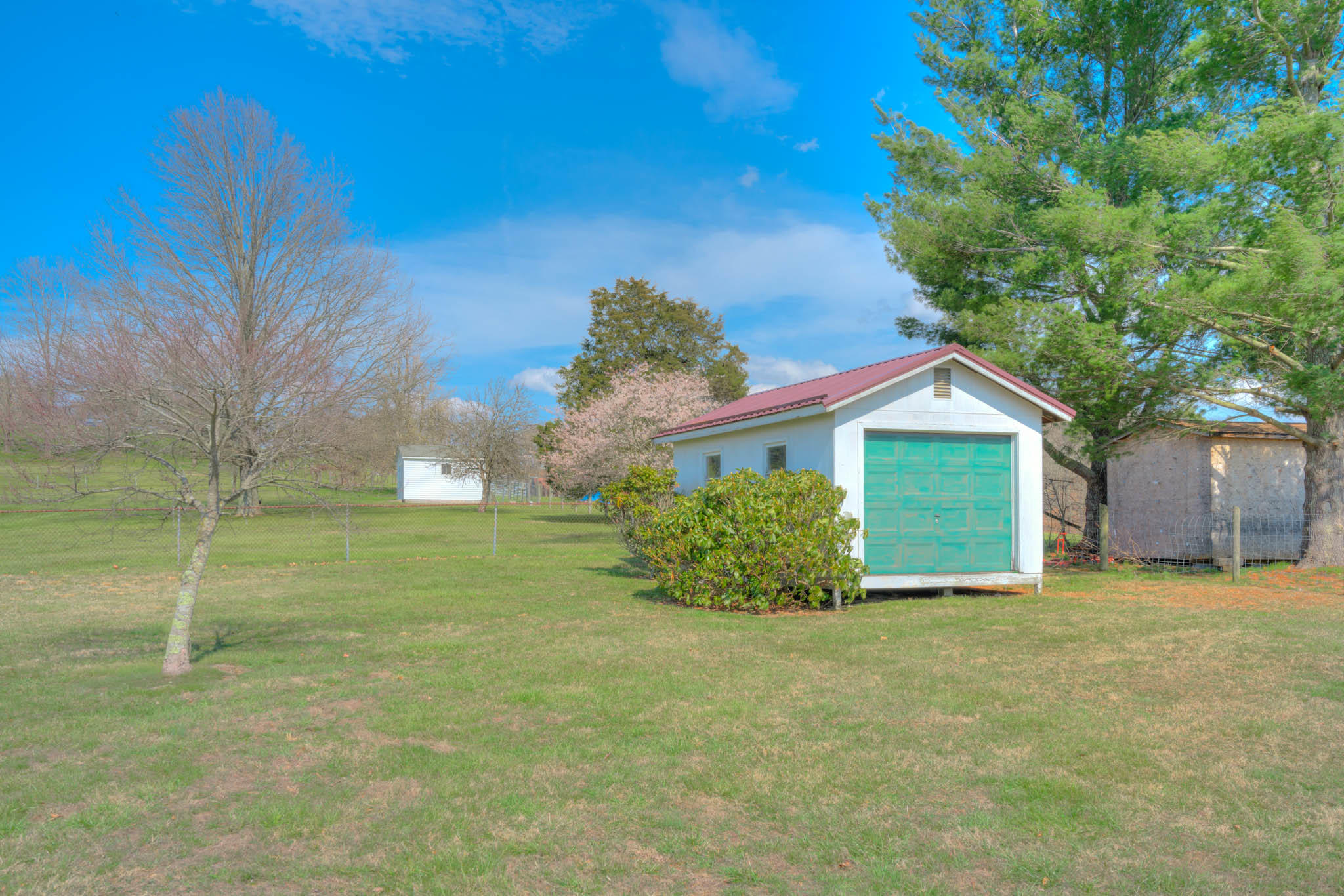 4964 Lizzie Gunn Road Pulaski, VA 24301 - Photo 20 of 31 a front view of a house with a yard