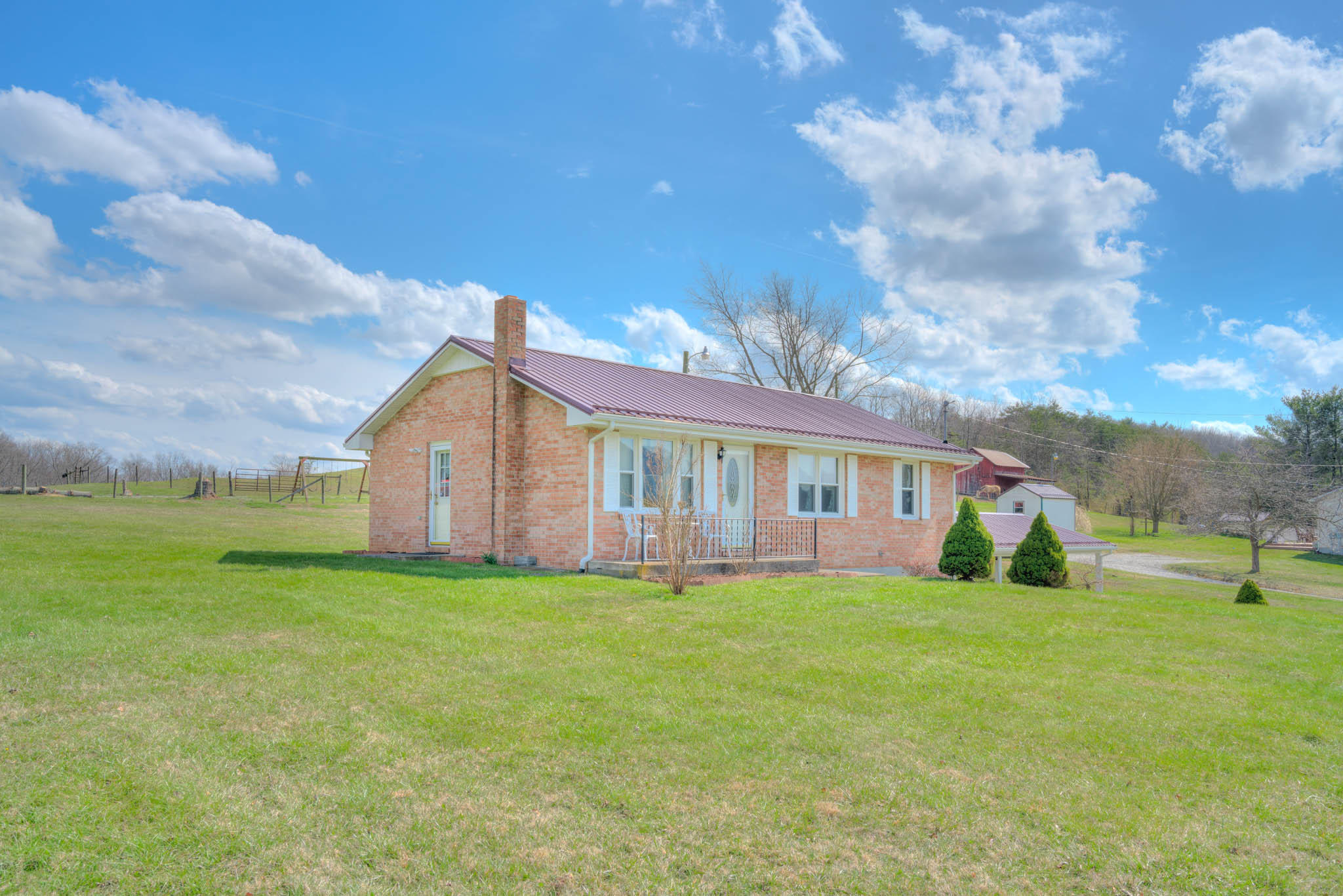4964 Lizzie Gunn Road Pulaski, VA 24301 - Photo 21 of 31 a view of a house with a yard