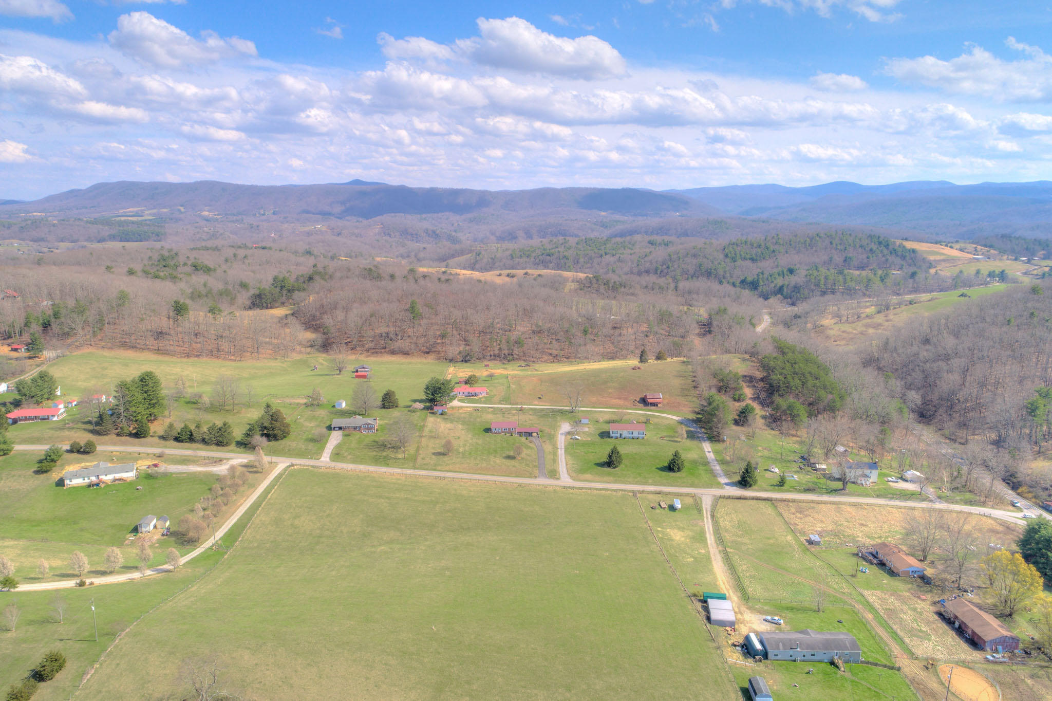 4964 Lizzie Gunn Road Pulaski, VA 24301 - Photo 25 of 31 an aerial view of residential houses with outdoor space