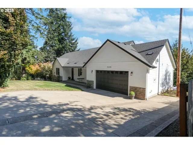 a front view of a house with yard