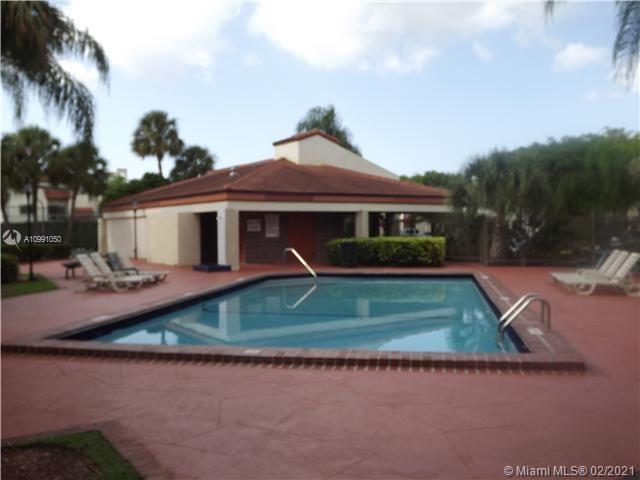 8600 Southwest 149th Avenue, Unit 612 Miami, FL 33193 - Photo 6 of 8 Secured pool with privacy fence