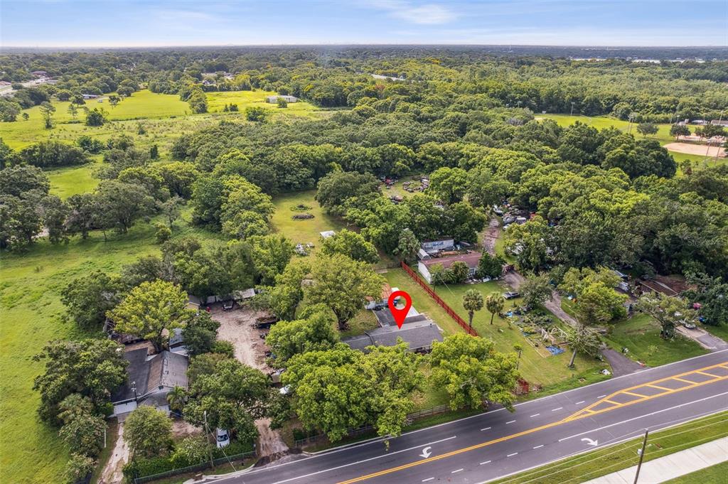 Undisclosed Address Ocoee, FL 34761 - Photo 6 of 23 a view of a garden with an outdoor space