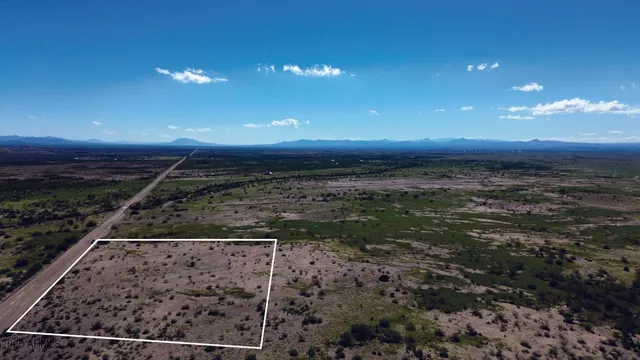 a view of a road with a yard