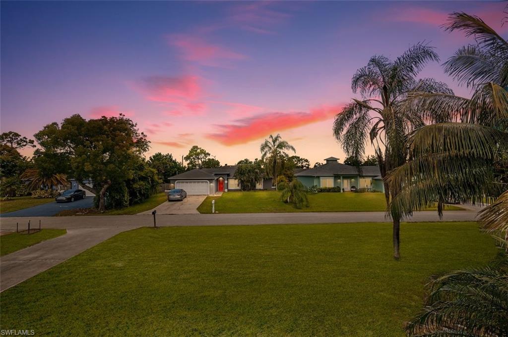 18245 Maple Road Fort Myers, FL 33967 - Photo 28 of 29 LIVING ROOM SUNSETS