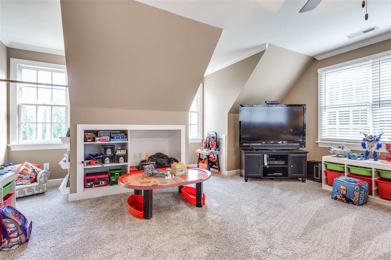 2117 Lovdal Drive Raleigh, NC 27613 - Photo 18 of 24 GREAT BONUS ROOM WITH LOTS OF NATURAL LIGHT. Bonus Room