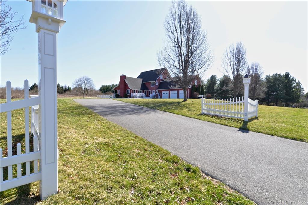 351 Killorin Road Watertown, CT 06795 - Photo 1 of 1 a front view of a house with a yard and garage