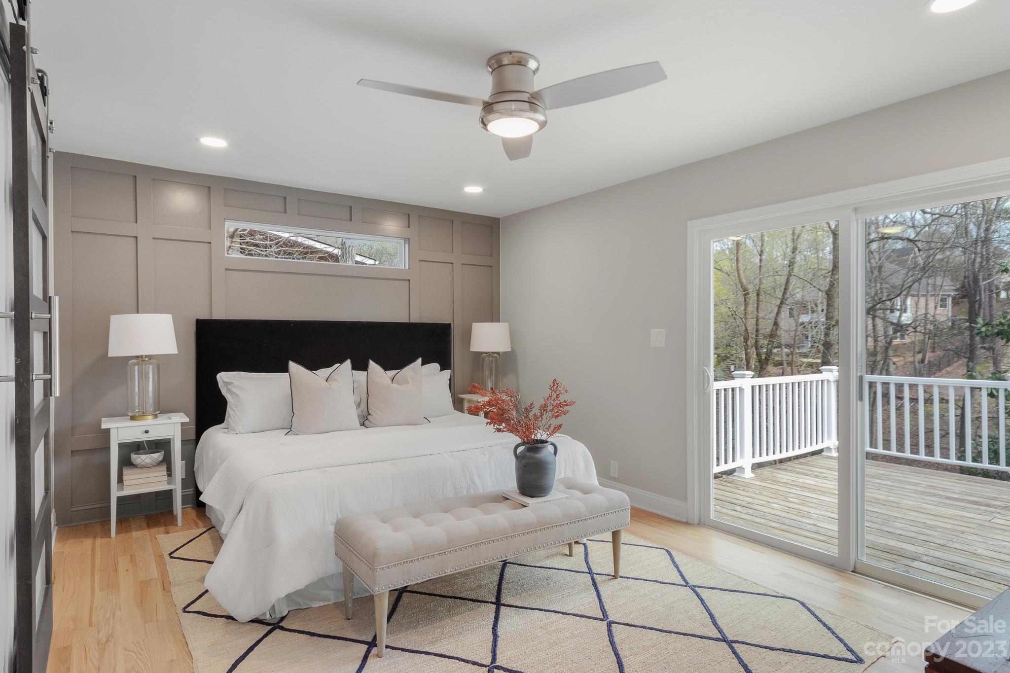 7022 Chelsea Day Lane Tega Cay, SC 29708 - Photo 15 of 48 a large white bed sitting in a room next to a window