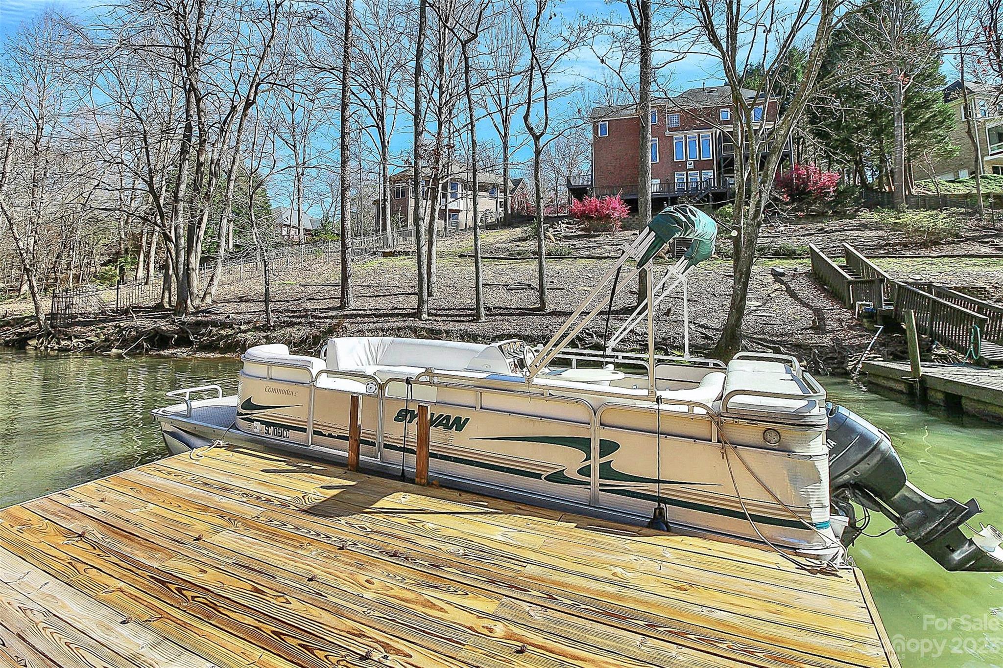7022 Chelsea Day Lane Tega Cay, SC 29708 - Photo 39 of 48 a view of a lake with houses