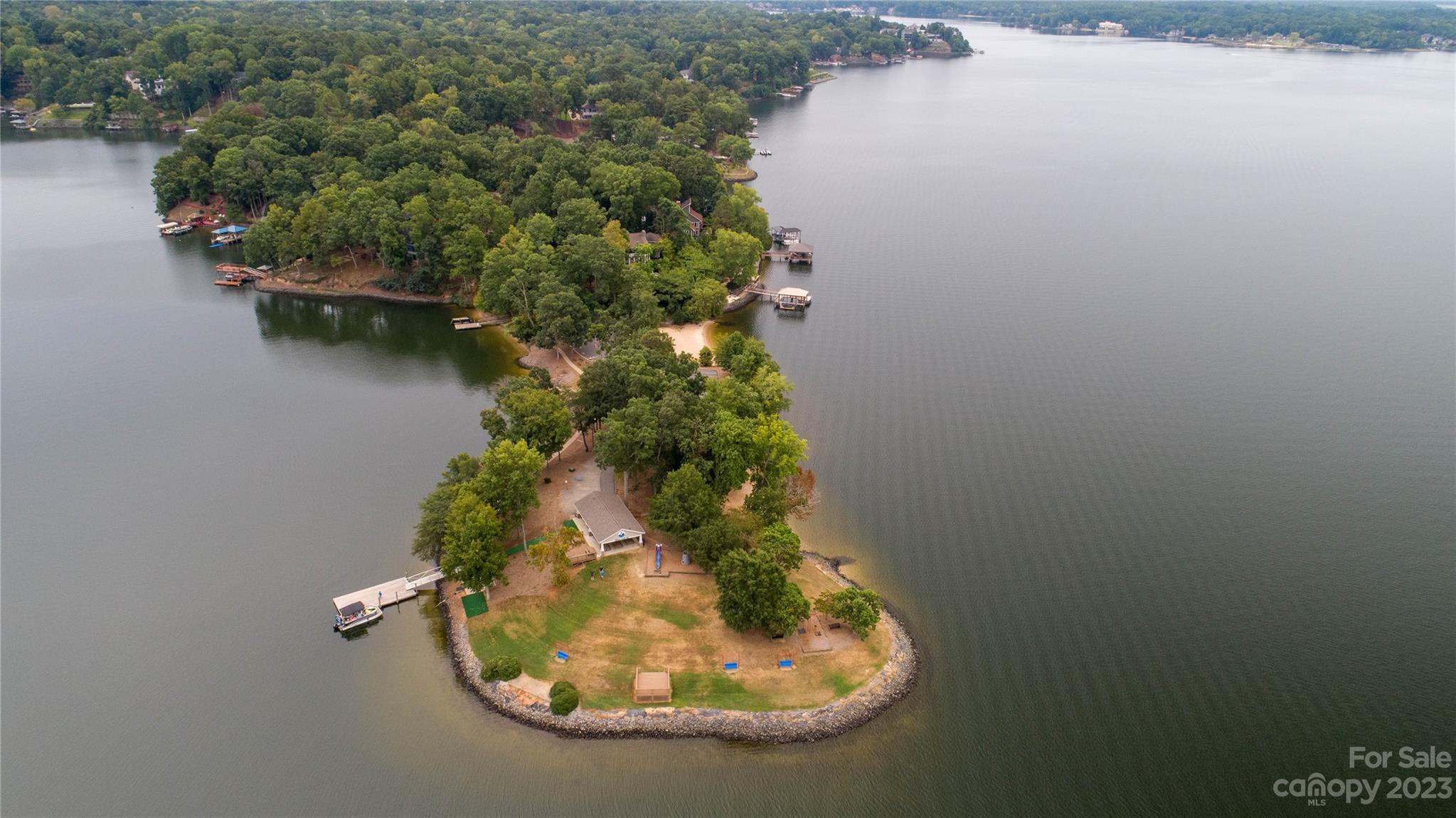 7022 Chelsea Day Lane Tega Cay, SC 29708 - Photo 41 of 48 an aerial view of a house with a lake view