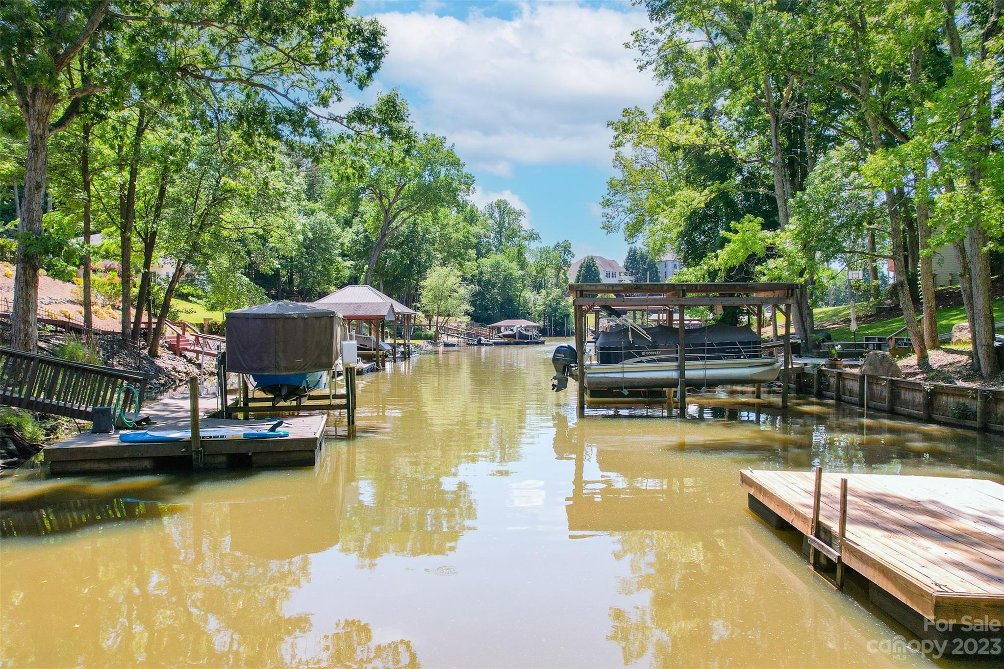 7022 Chelsea Day Lane Tega Cay, SC 29708 - Photo 45 of 48 a view of a swimming pool with lounge chair