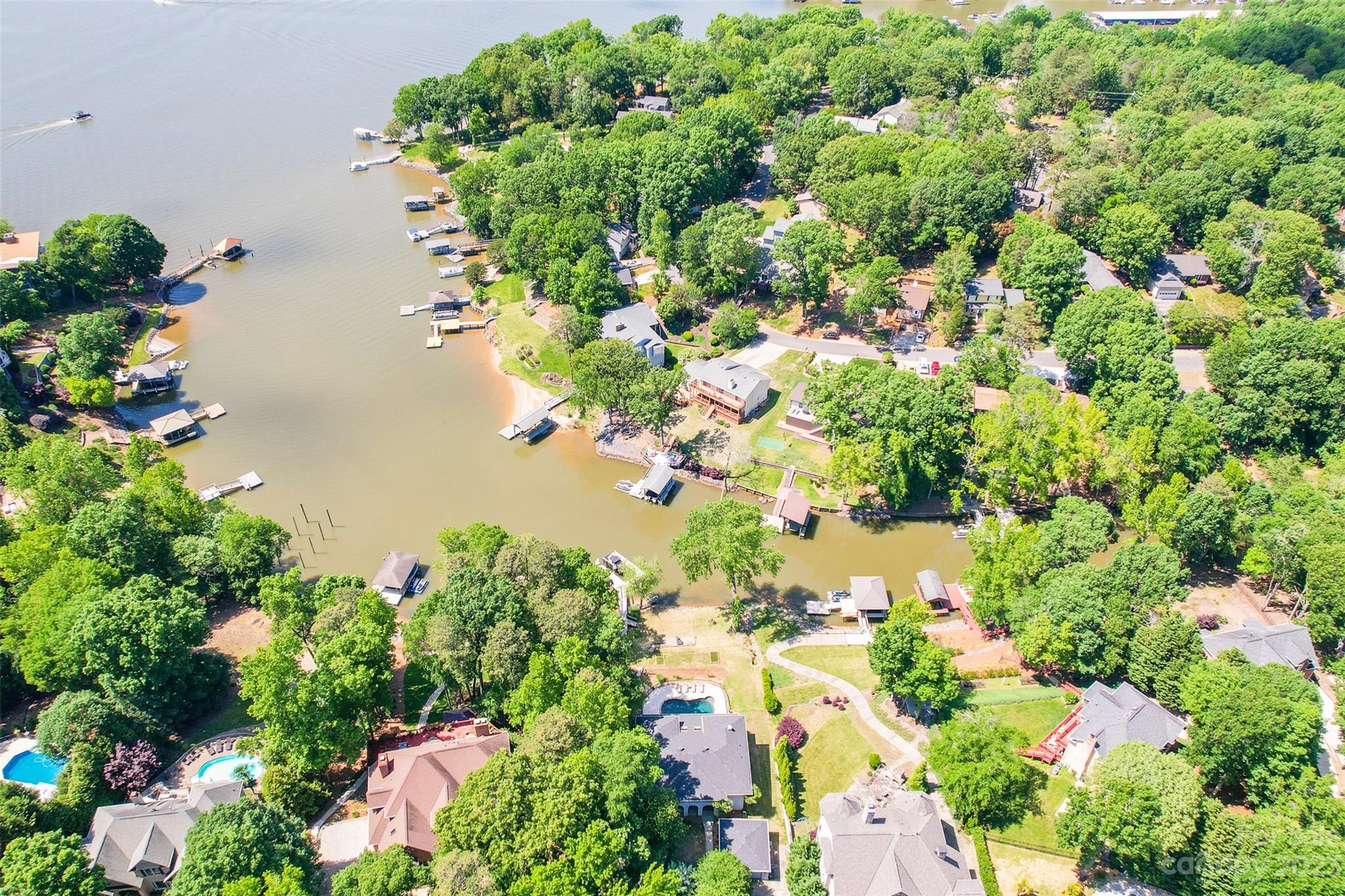 7022 Chelsea Day Lane Tega Cay, SC 29708 - Photo 46 of 48 an aerial view of a house with a yard and garden