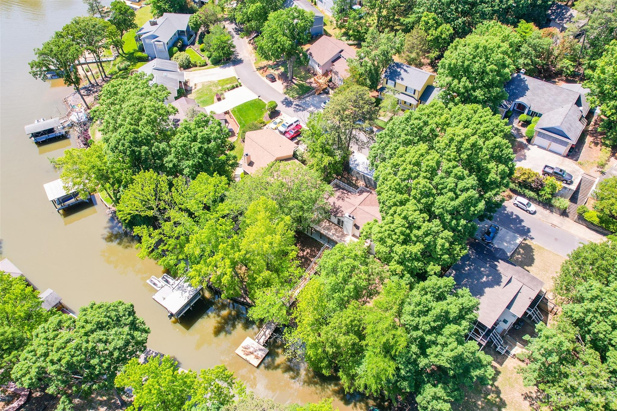 7022 Chelsea Day Lane Tega Cay, SC 29708 - Photo 47 of 48 an aerial view of a house with a yard and garden