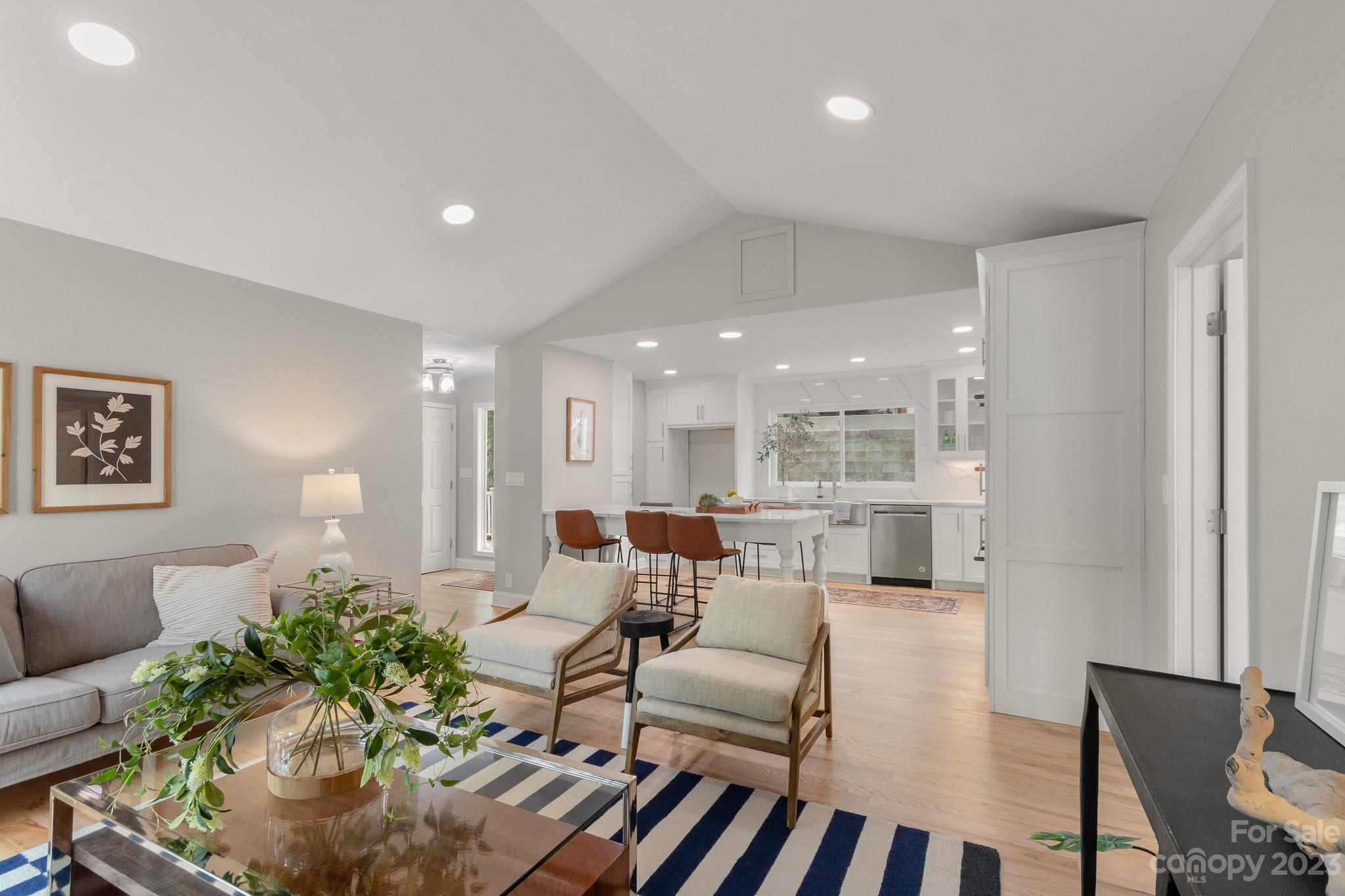 7022 Chelsea Day Lane Tega Cay, SC 29708 - Photo 7 of 48 a living room with furniture and a large window
