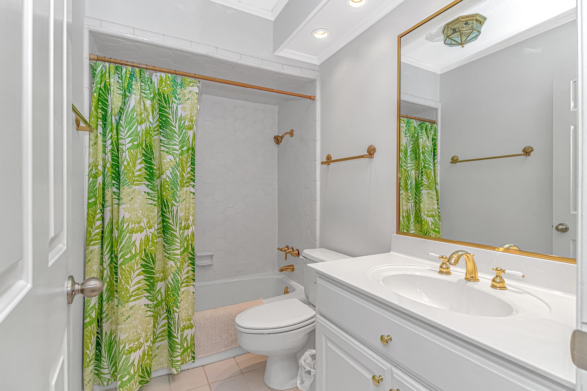 119 University Circle Conway, SC 29526 - Photo 24 of 40 Bathroom with vanity, shower / bath combination with curtain, crown molding, light tile patterned flooring, and recessed lighting