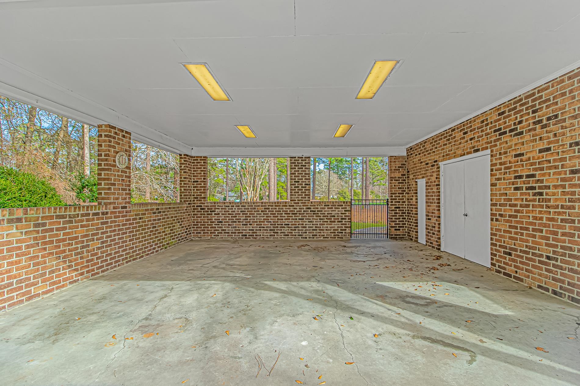 119 University Circle Conway, SC 29526 - Photo 32 of 40 View of patio / terrace with a carport