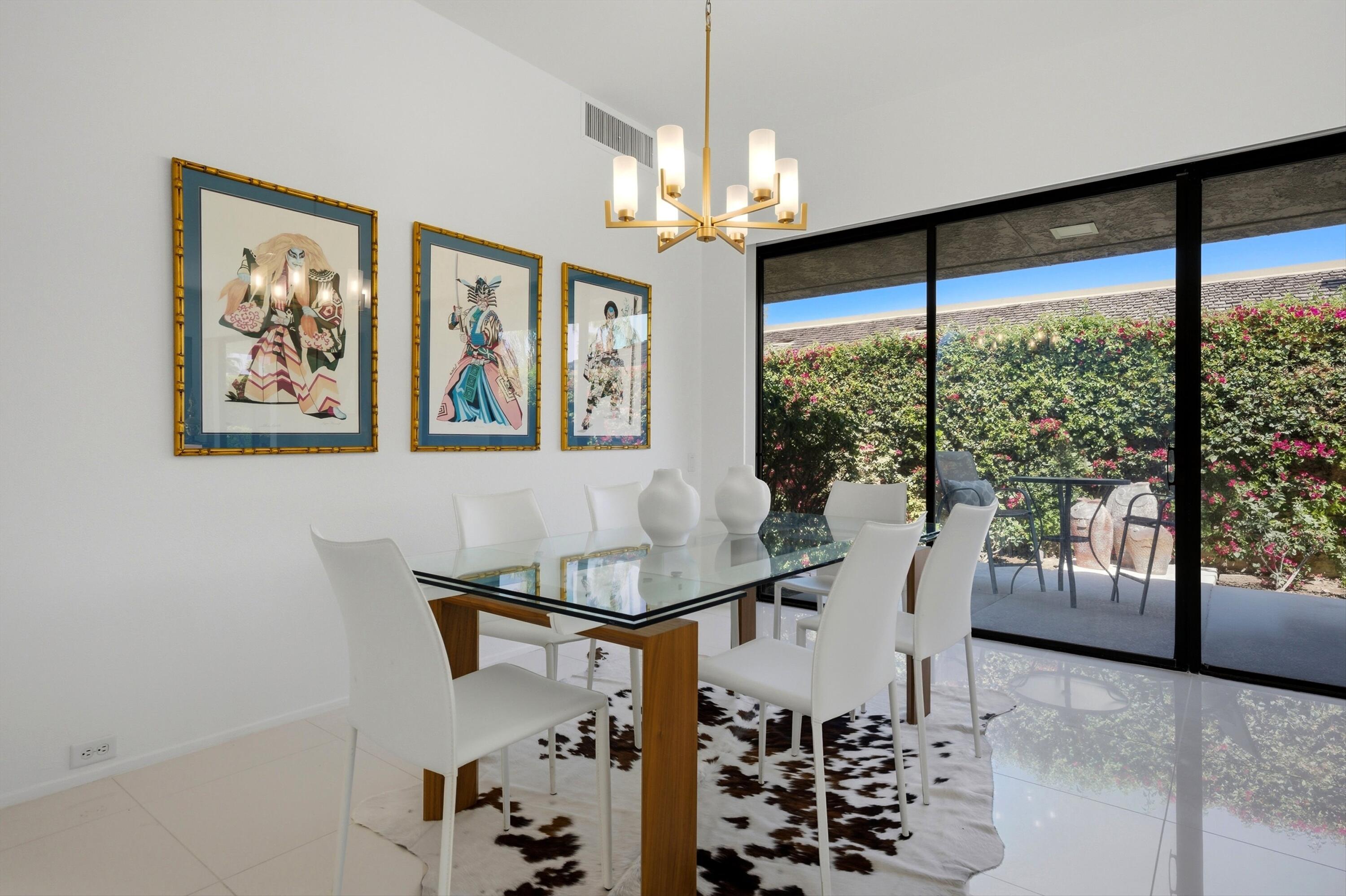 23 Mt Holyoke Drive Rancho Mirage, CA 92270 - Photo 11 of 50 a view of a dining room with furniture window and outside view