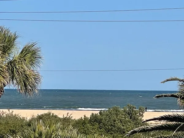 a view of a swimming pool and an outdoor space