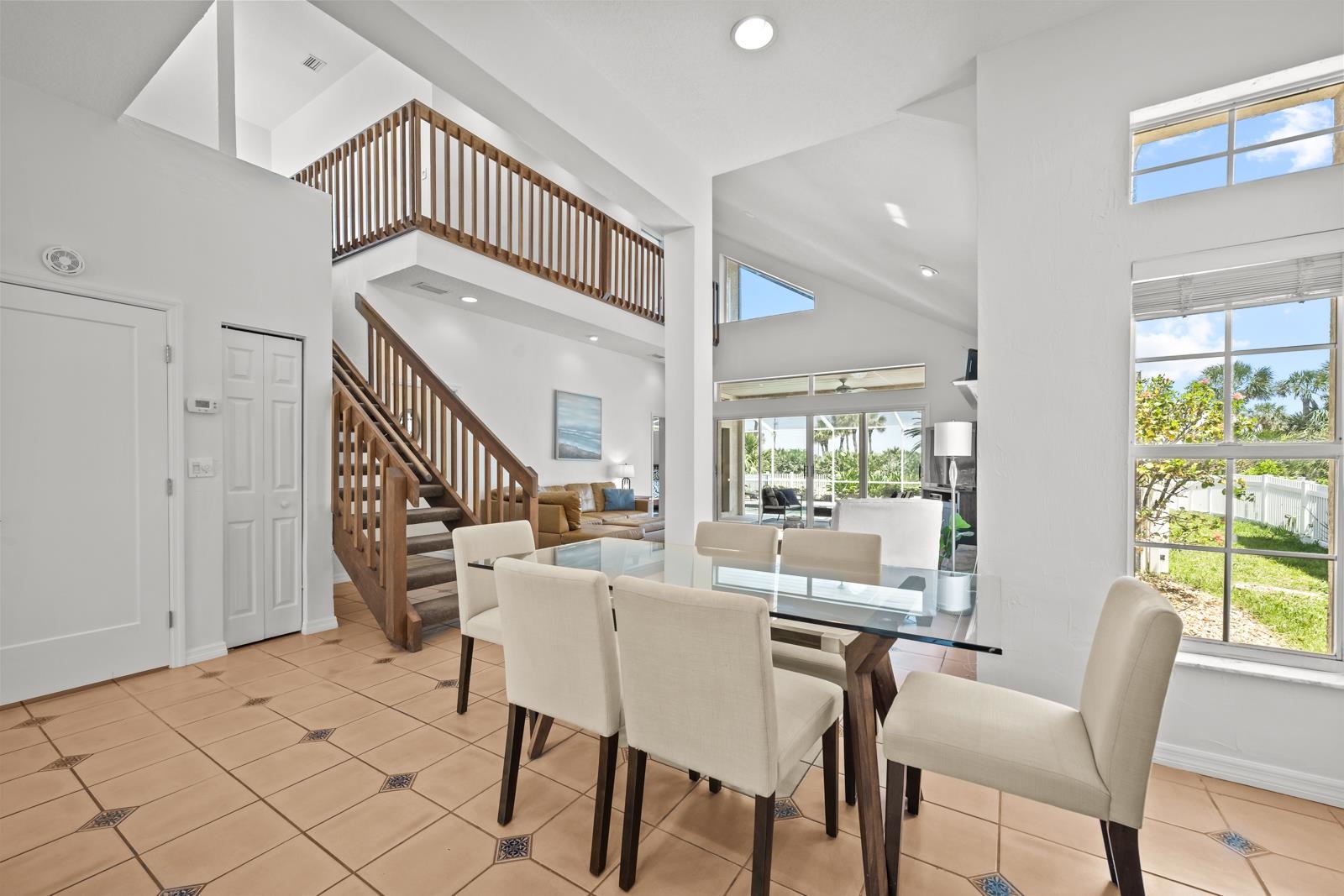 9224 July Lane St. Augustine, FL 32080 - Photo 18 of 88 a view of a dining room with furniture window and wooden floor