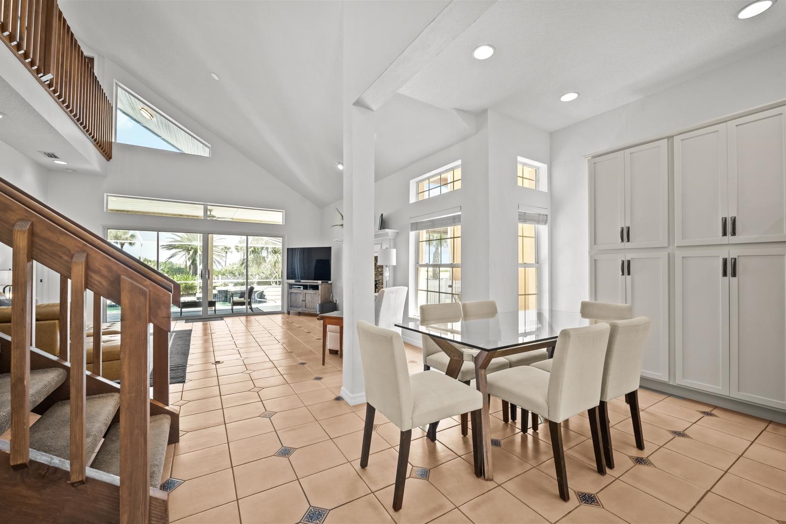 9224 July Lane St. Augustine, FL 32080 - Photo 19 of 88 a view of a dining room with furniture and a large window