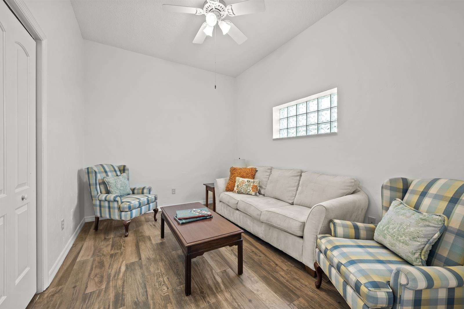 9224 July Lane St. Augustine, FL 32080 - Photo 31 of 88 a living room with furniture and a wooden floor