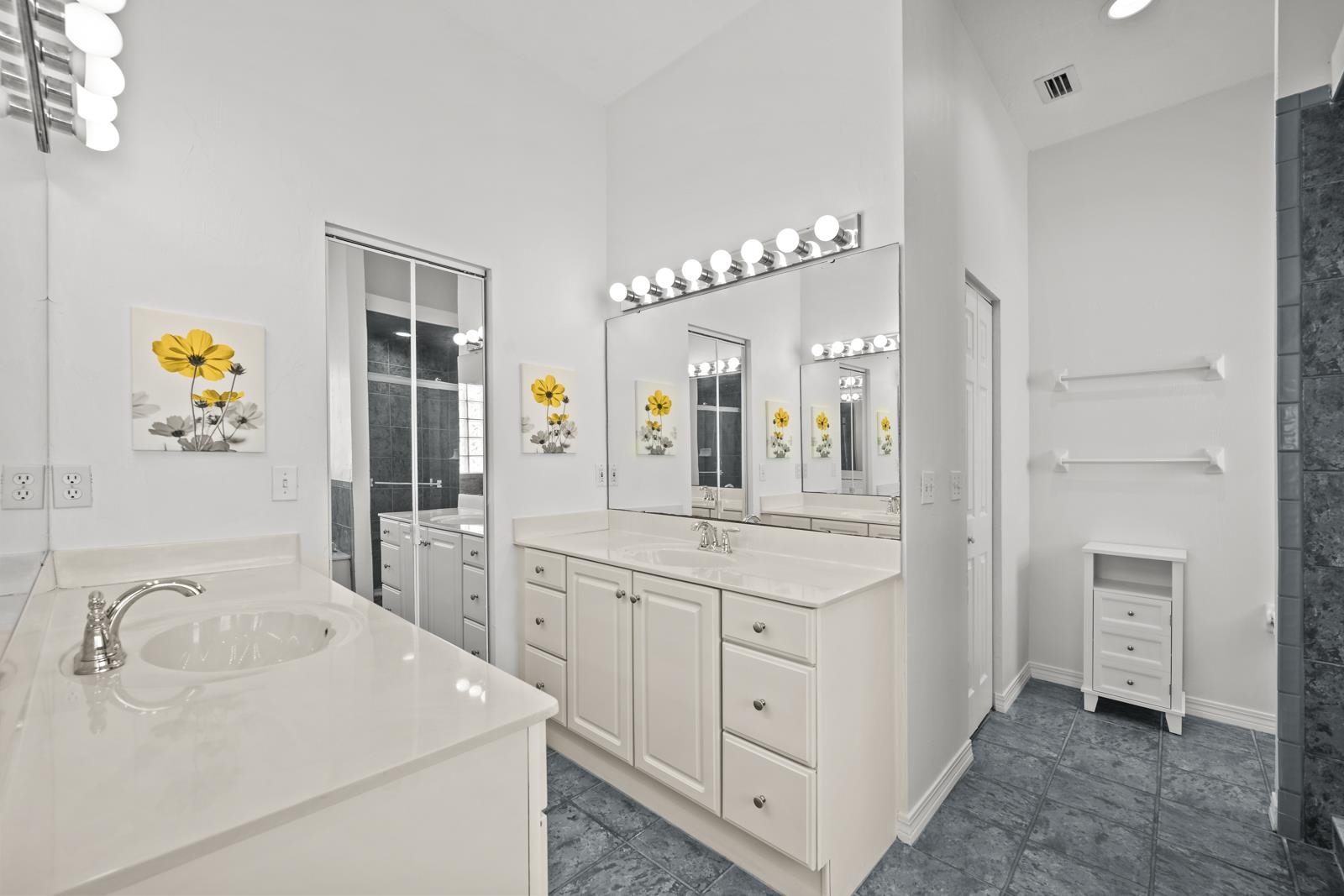 9224 July Lane St. Augustine, FL 32080 - Photo 39 of 88 a spacious bathroom with a sink double vanity and a mirror