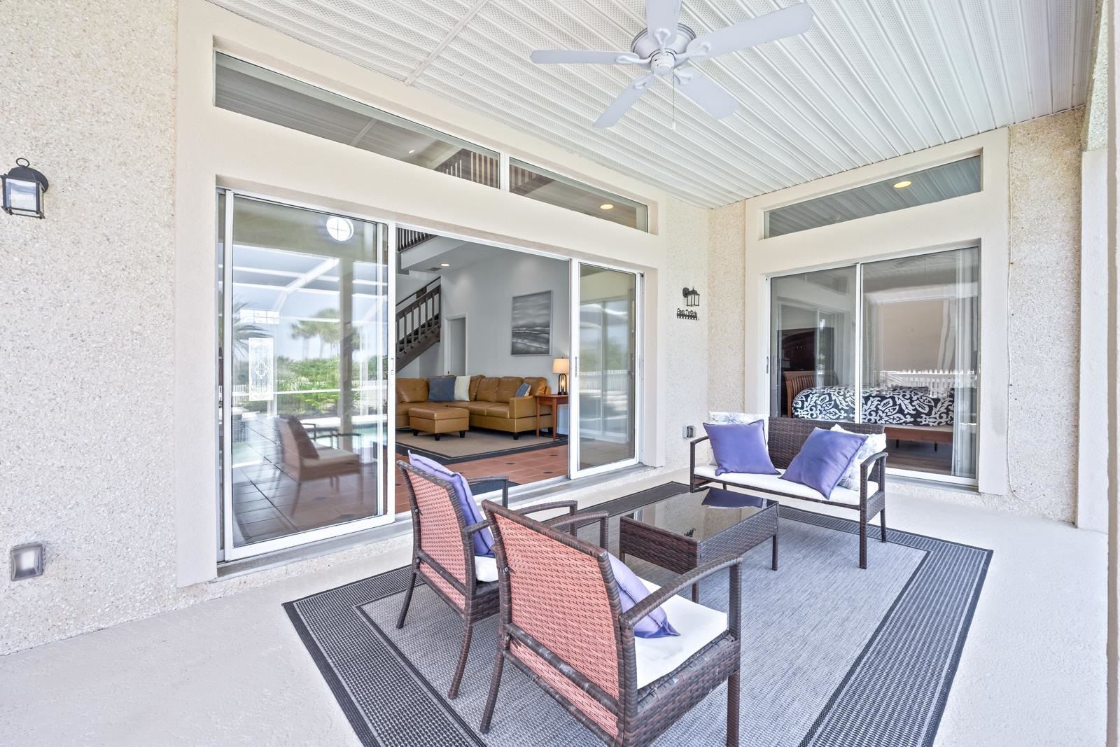 9224 July Lane St. Augustine, FL 32080 - Photo 42 of 88 a view of a dining room with furniture window and wooden floor
