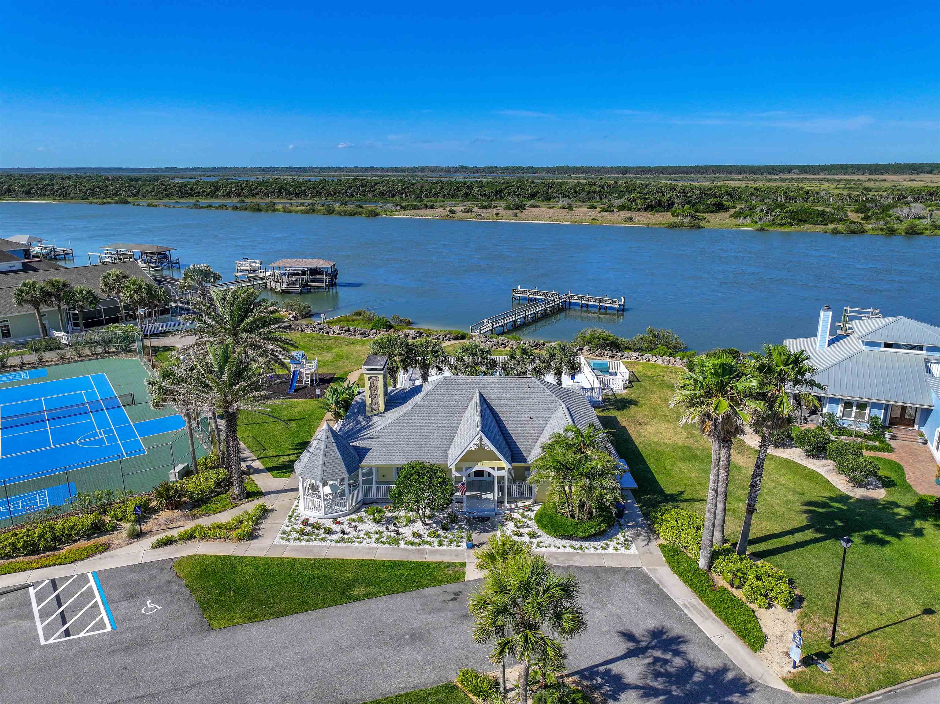 9224 July Lane St. Augustine, FL 32080 - Photo 48 of 88 an aerial view of residential houses with outdoor space and swimming pool