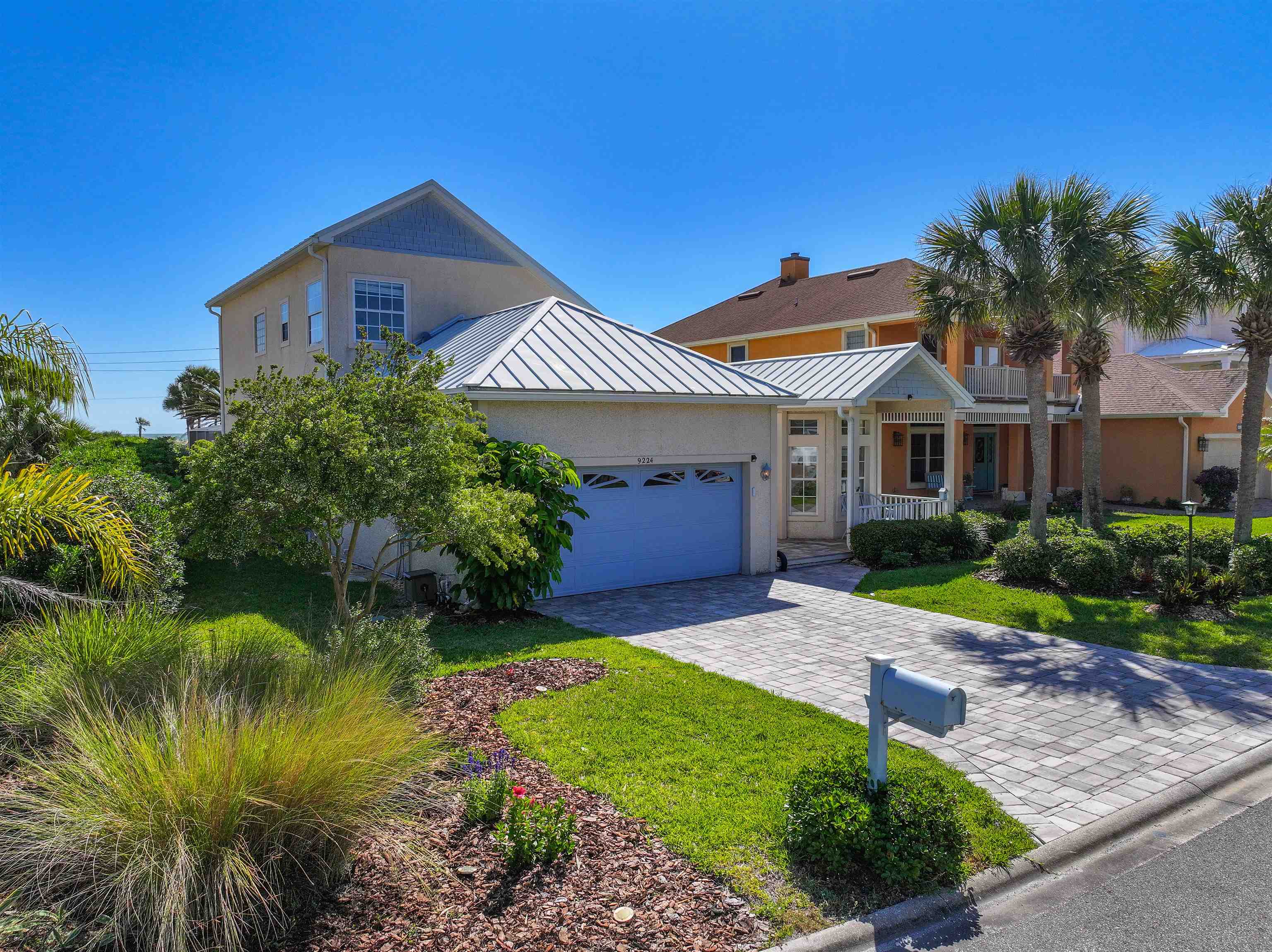 9224 July Lane St. Augustine, FL 32080 - Photo 76 of 88 a front view of a house with garden