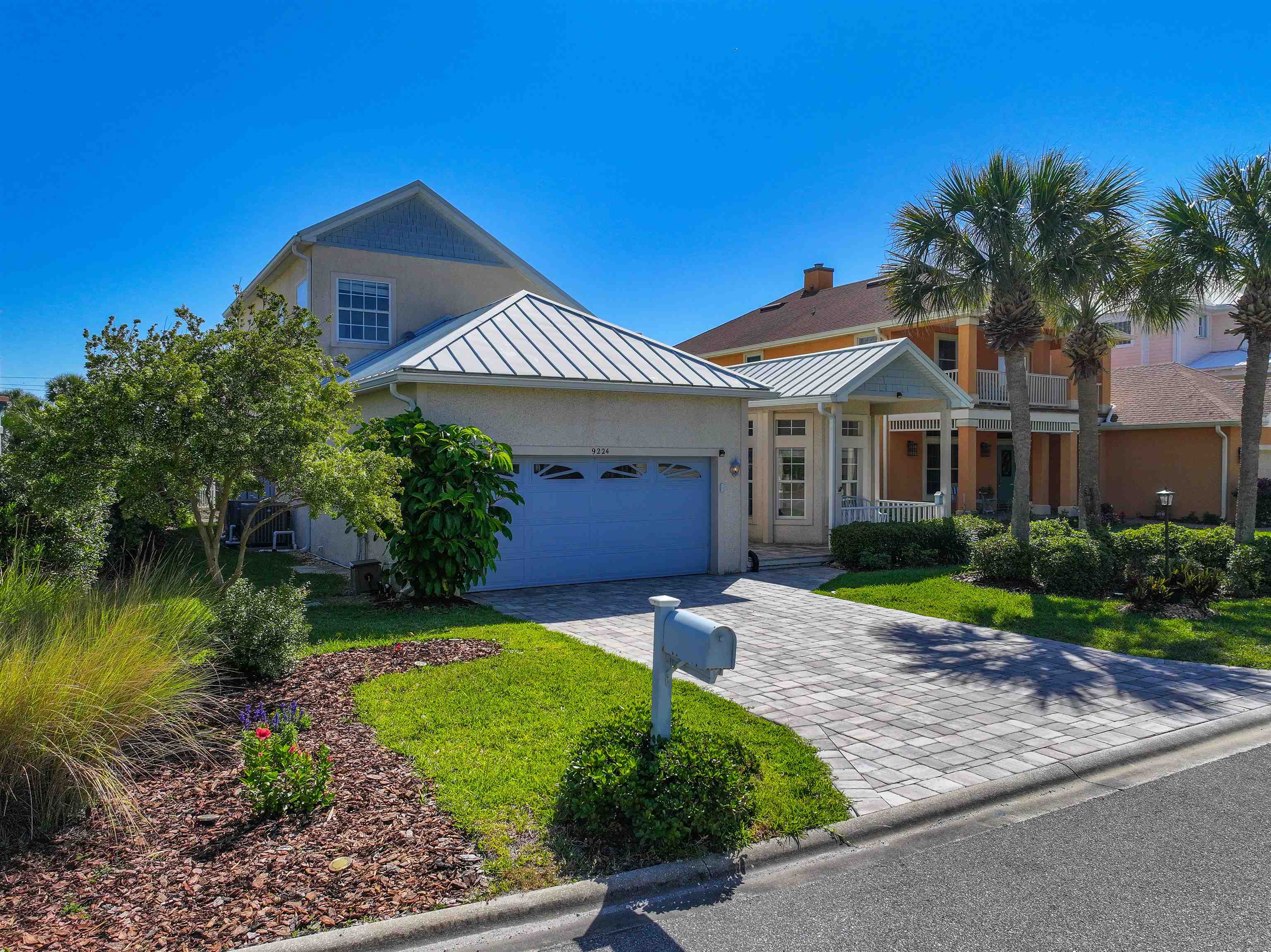 9224 July Lane St. Augustine, FL 32080 - Photo 78 of 88 a front view of a house with garden