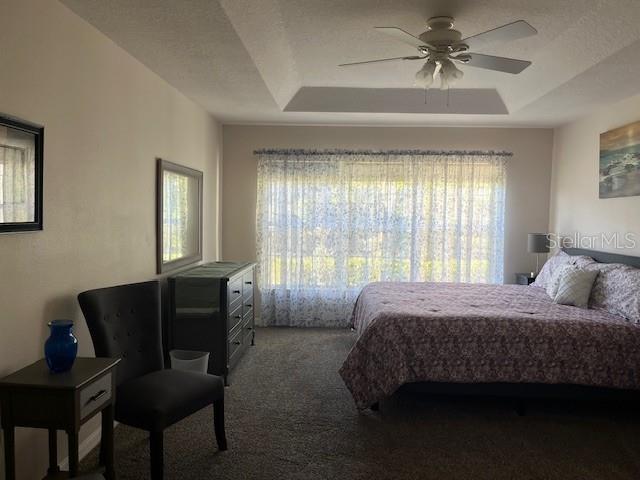 7928 Southwest 80th Pl Road Ocala, FL 34476 - Photo 13 of 30 a bedroom with a bed and a window