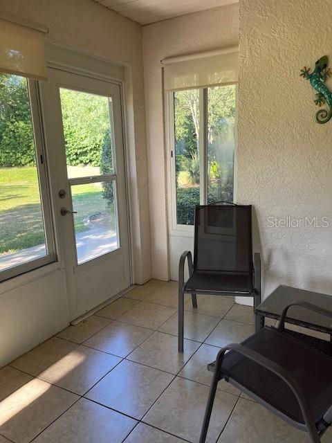 7928 Southwest 80th Pl Road Ocala, FL 34476 - Photo 25 of 30 a living room with furniture and a window