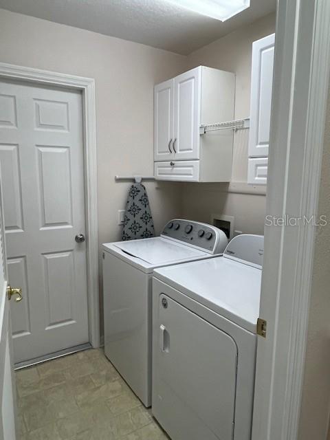 7928 Southwest 80th Pl Road Ocala, FL 34476 - Photo 28 of 30 a utility room with dryer and washer