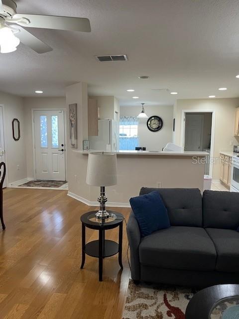 7928 Southwest 80th Pl Road Ocala, FL 34476 - Photo 9 of 30 a living room with furniture and windows