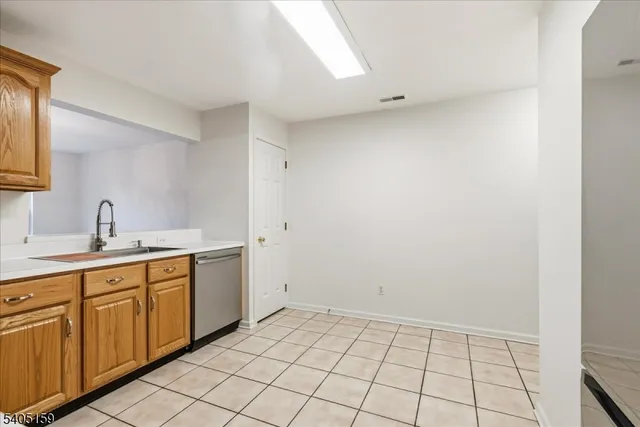 a view of a kitchen with a sink
