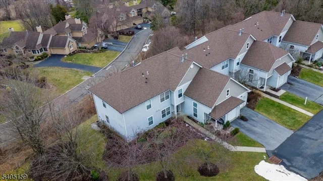 an aerial view of a house with a garden
